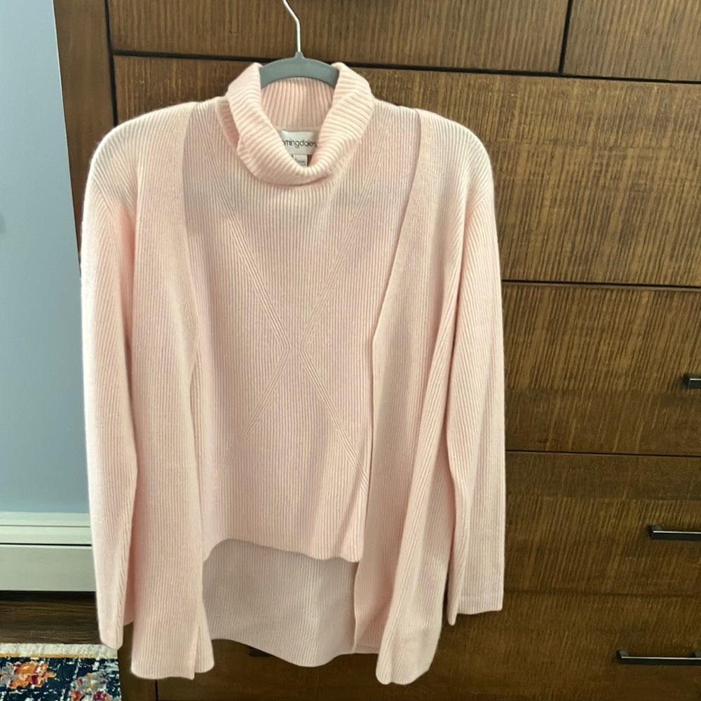 100% Cashmere Pink Turtleneck Sweater
Two-piece Sweater Set.